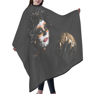 Personality  Woman In Sugar Skull Makeup And Creepy Dark Costume Holding Golden Skull Isolated On Black Hair Cutting Cape