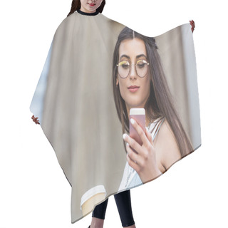 Personality  Portrait Of Young Woman In Eyeglasses With Coffee To Go Using Smartphone On Street Hair Cutting Cape