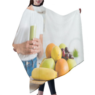 Personality  Selective Focus Of Ripe Delicious Fruits Near Girl Holding Glass With Green Smoothie  Hair Cutting Cape