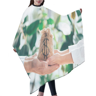 Personality  Cropped Shot Of People Holding Sackcloth Bag With Dollar Sign In Hands  Hair Cutting Cape