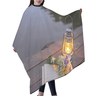 Personality  Vintage Oil Lamp On A Wooden Background On The Background Of The Evening Forest Lake. Hair Cutting Cape