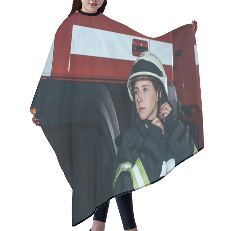 Personality  Portrait Of Female Firefighter In Uniform Checking Helmet At Fire Station Hair Cutting Cape