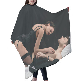 Personality  Beautiful Woman In Stockings And Lingerie Lying On Shirtless Man Isolated On Black Hair Cutting Cape