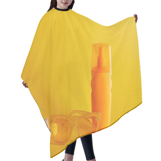 Personality  Sunscreen In Orange Bottle Near Sunglasses And Seashell On Dark Yellow Background Hair Cutting Cape