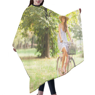 Personality  Beautiful Girl Is Cycling In A Park With A City Bike Hair Cutting Cape