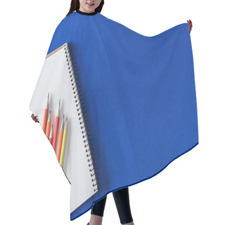 Personality  Top View Of Various Colorful Pencils And Blank Textbook On Blue Background  Hair Cutting Cape