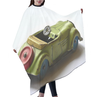 Personality  Isolated Green Convertible Toy On White Background Hair Cutting Cape