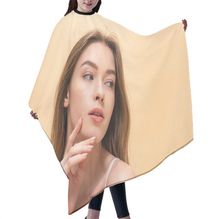 Personality  Portrait Of Pensive Beautiful Young Girl Holding Hand Near Face Isolated On Beige Hair Cutting Cape