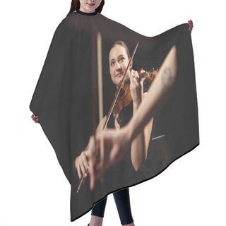Personality  Smiling Professional Musicians Playing Classical Music On Violins On Dark Stage  Hair Cutting Cape