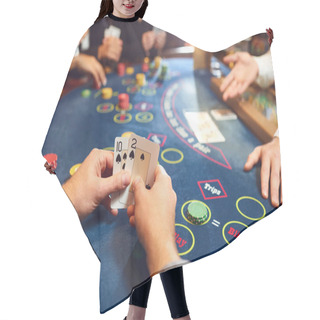 Personality  Close-up Hands Of A Poker Player Checking Cards In A Casino. Hair Cutting Cape