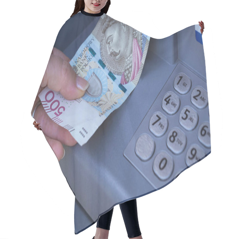 Personality  Polish money withdrawn from an ATM hair cutting cape