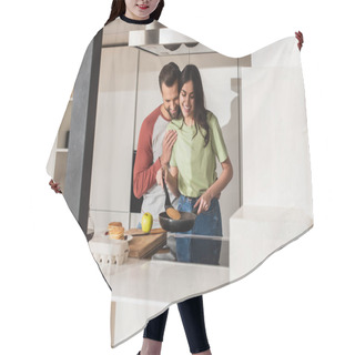 Personality  Smiling Man Hugging Girlfriend Cooking Pancakes In Kitchen  Hair Cutting Cape