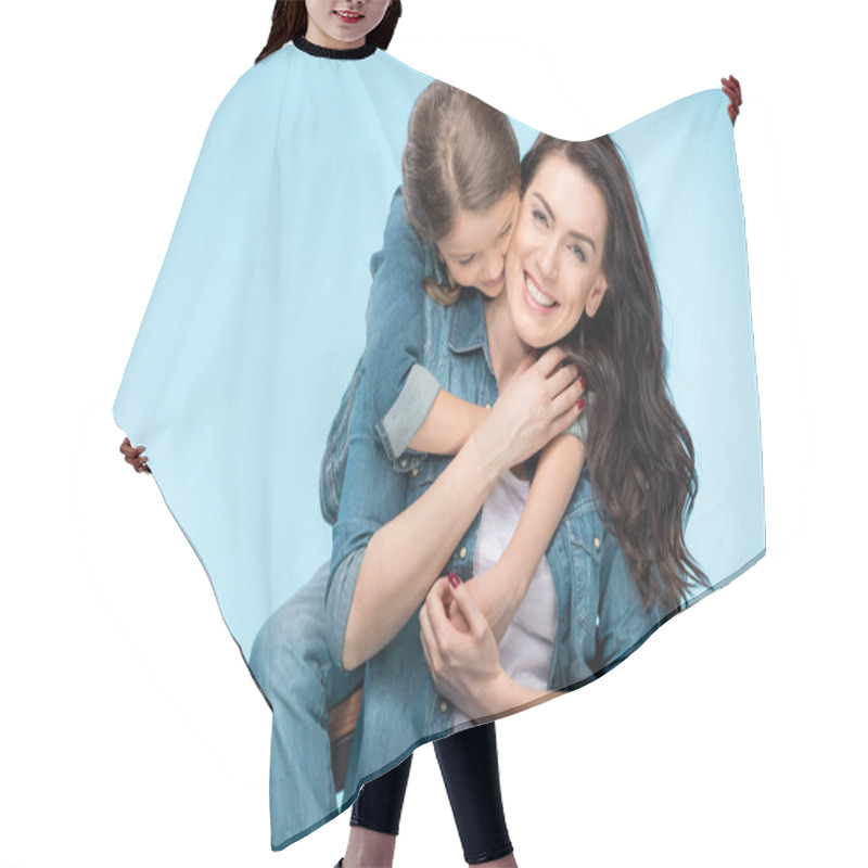 Personality  mother and daughter hugging hair cutting cape