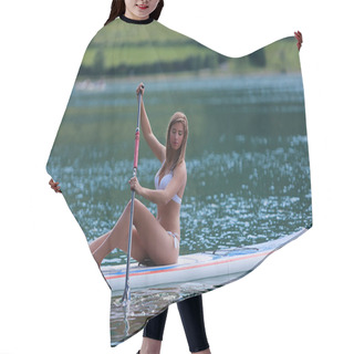 Personality  Young Woman In Stand Up Paddling While Sitting On The Lake. Hair Cutting Cape