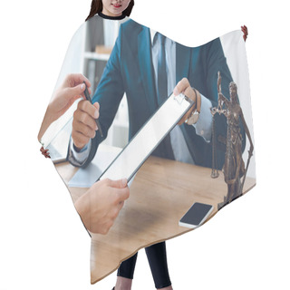 Personality  Cropped Shot Of Lawyer Giving Clipboard And Pen To Young Woman In Office Hair Cutting Cape