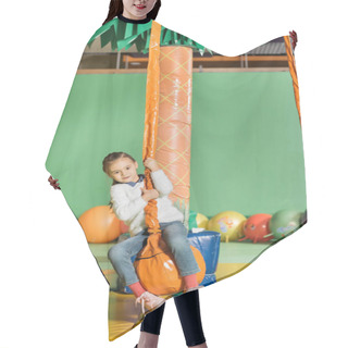 Personality  Cute Little Kid Swinging On Swing In Entertainment Center Hair Cutting Cape
