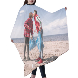 Personality  Couple With Trash Bags And Grabbers Kissing While Standing On Sand  Hair Cutting Cape