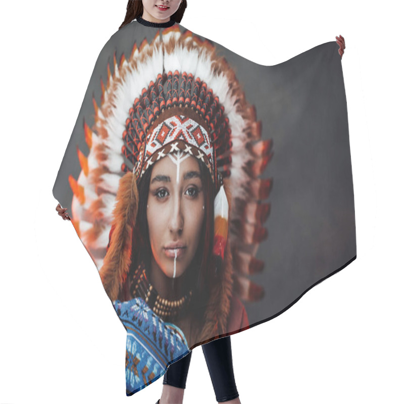 Personality  Portrait Of A Beautiful American Indian Woman In Ethnical Costume And Traditional Make Up Hair Cutting Cape