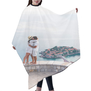 Personality  Couple Hugging On Viewpoint Near Island Of Sveti Stefan With Hotel Resort In Adriatic Sea, Budva, Montenegro Hair Cutting Cape