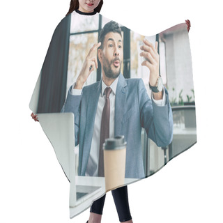 Personality  Excited Businessman Showing Idea Gesture During Video Call On Smartphone  Hair Cutting Cape