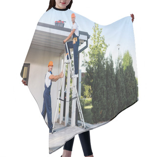Personality  Builders In Uniform Using Ladder Near Building Outdoors Hair Cutting Cape