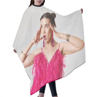 Personality  Surprised Woman In Trendy Pink Outfit Gasps, Touching Her Face, Standing On Grey Background Hair Cutting Cape