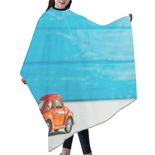 Personality  Close-up Shot Of Red Toy Car On Blue Wooden Background Hair Cutting Cape
