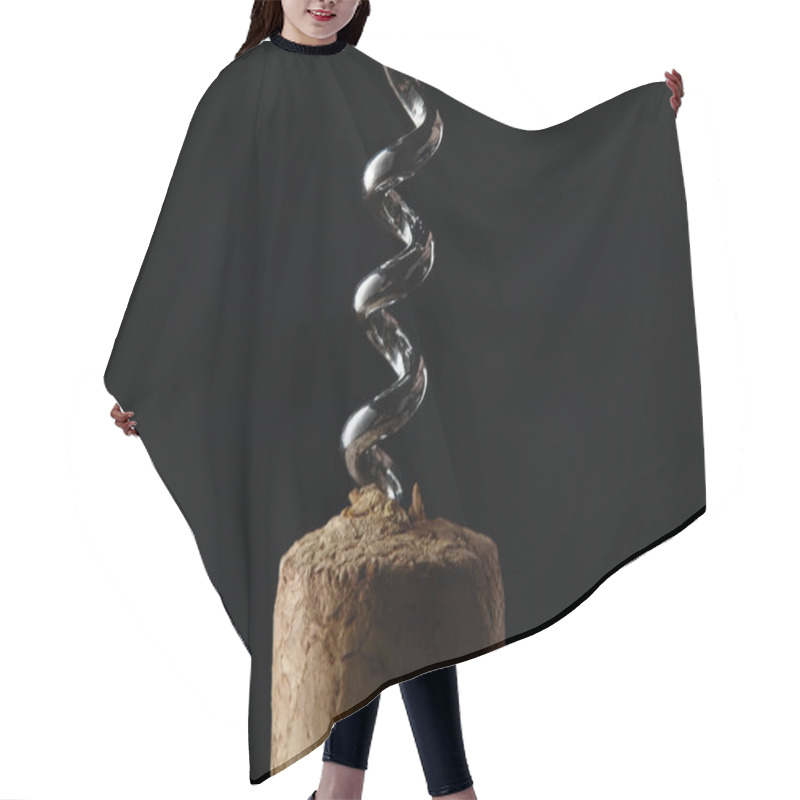 Personality  Close up view of wooden cork and steel corkscrew isolated on black hair cutting cape