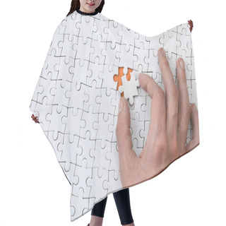 Personality  The Texture Of A White Jigsaw Puzzle In The Assembled State With One Missing Element That The Male Hand Puts In Hair Cutting Cape