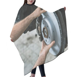 Personality  Cropped View Of Car Mechanic Holding Metallic Car Brake Near Automobile  Hair Cutting Cape