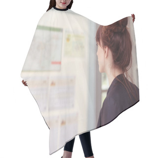 Personality  Young Woman Reading Notices On A Board Hair Cutting Cape