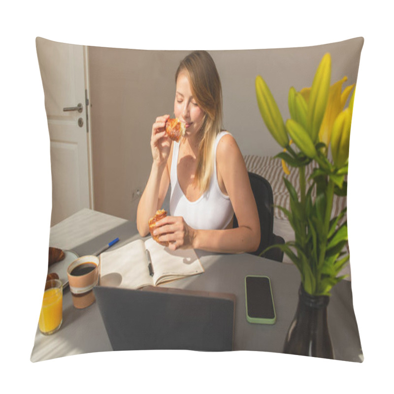 Personality  Freelancer holding croissant near devices and drinks at home  pillow covers