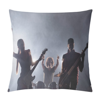 Personality  KYIV, UKRAINE - AUGUST 25, 2020: Woman With Rock Sign Standing Near Guitarist During Live Concert With Drummer On Background Pillow Covers