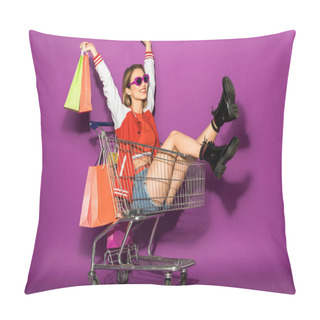 Personality  Beautiful Happy Young Woman In Sunglasses Holding Paper Bags And Sitting In Shopping Trolley On Violet  Pillow Covers