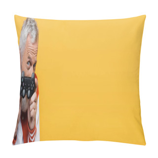 Personality  KYIV, UKRAINE - JULY 29, 2021: Middle Aged Man In Bomber Jacket Covering Face With Joystick Isolated On Yellow, Banner Pillow Covers