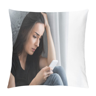 Personality  Disappointed Girl Using Smartphone While Sitting By Window At Home And Holding Hand On Head Pillow Covers