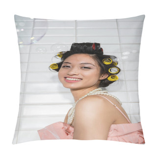 Personality  Portrait Of Joyful And Young Asian Woman With Hair Curlers Standing In Pearl Necklace Near Blurred Soap Bubbles In Laundry Room With White Tiles, Housewife, Natural Beauty  Pillow Covers