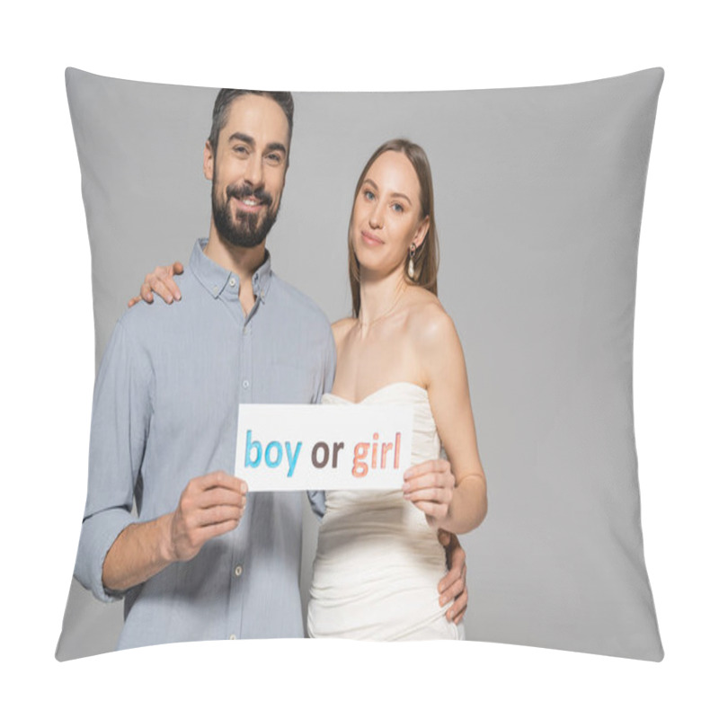 Personality  Positive And Trendy Pregnant Woman Holding Card With Boy Or Girl Lettering And Hugging Stylish Husband During Gender Reveal Surprise Party Isolated On Grey, Expecting Parents Concept Pillow Covers