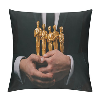 Personality  KYIV, UKRAINE - JANUARY 10, 2019: Partial View Of Man In Suit Holding Oscar Awards Isolated On Black Pillow Covers