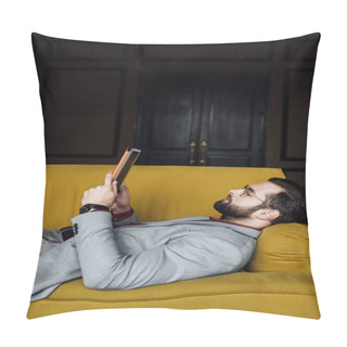 Personality  Bearded Man Using Digital Tablet While Lying On Yellow Sofa Pillow Covers