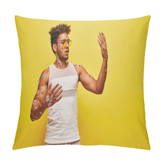 Personality  Surprised African American Man Looking At Stickers On His Hands And Body On Yellow Background Pillow Covers