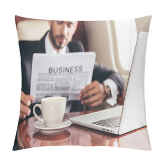 Personality  Selective Focus Of Businessman In Suit Reading Business Newspaper And Taking Cup In Private Plane  Pillow Covers