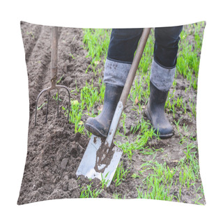Personality  Farmer In Rubber Boots Digging In The Garden With A Shovel. Preparing Soil For Planting In Spring. Gardening. Pillow Covers