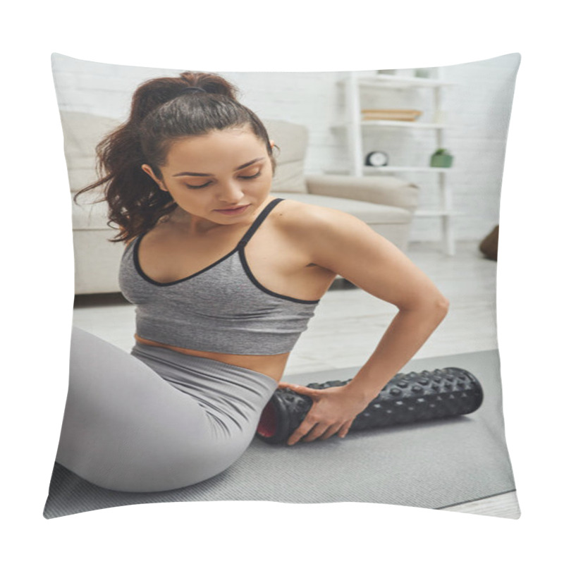 Personality  Young Brunette Woman In Activewear Holding Modern Roller Massager For Lymphatic Drainage And Sitting On Fitness Mat At Home, Sense Of Tranquility And Promote Relaxation Concept, Tension Relief Pillow Covers
