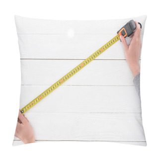 Personality  Cropped View Of Man Holding Industrial Measuring Tape On White Wooden Background Pillow Covers