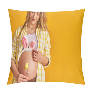 Personality  Close-up, Pregnant Blonde Wearing Bunny Ears On Her Stomach On Easter Day On Yellow Background. Expectant Mother Brings An Easter Egg On A Stick To Her Belly. Woman Is Expecting Child In Spring. Pillow Covers