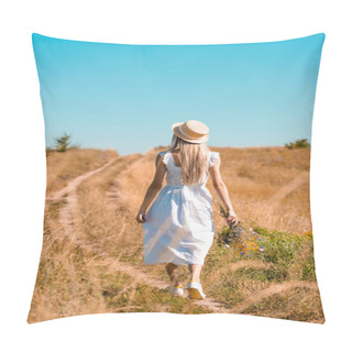 Personality  Back View Of Young Woman In White Dress And Straw Hat Walking In Field With Bouquet Of Wildflowers Pillow Covers