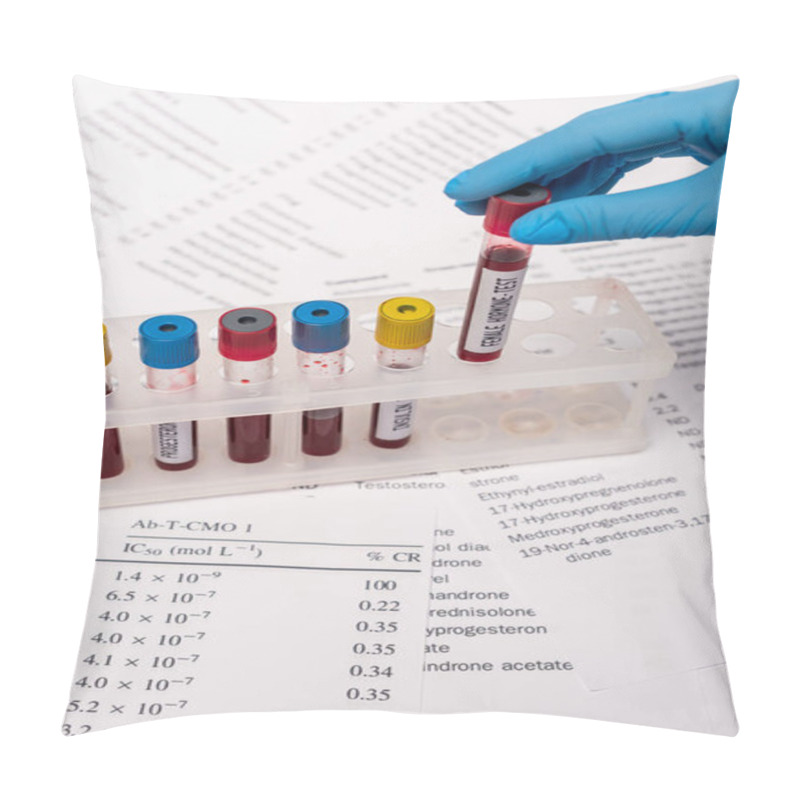 Personality  Cropped View Of Doctor Holding Test Tube With Female Hormone Test Near Stand And Lists With Hormones Isolated On White Pillow Covers