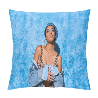 Personality  Positive And Young African American Woman With Bold Makeup And Golden Earrings Posing In Beret And Denim Jacket On Blue Textured Background, Stylish Denim Attire Pillow Covers