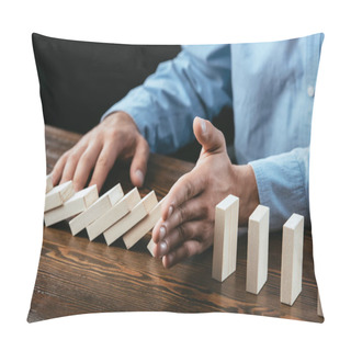 Personality  Partial View Of Man Sitting At Desk And Preventing Wooden Blocks From Falling  Pillow Covers